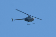 Morten 15 juli 2021 - Helikopter over Høyenhall, solen er skarp og han er akkurat utenfor rekkevidde