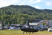 Morten 1 juli 2017 - LN-OGM på Flisa, det er Nordenfjeldske Luftfart eller Helitrans med sin Robinson R44 Raven II fra 2005