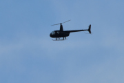 Morten 6 september 2020 - Robinson R44 over Høyenhall, litt motlys og litt for langt unna