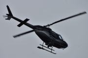 Morten 24 august 2021 - LN-OCF besøker Høyenhall, det er Skyward som kommer med sin Bell Textron 206B fra 1980