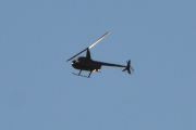 Morten 16 desember 2021 - Robinson R44 over Høyenhall, klokken er 12.33. Mr. Robinson er også tilstede i dag