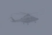 Morten 3 februar 2022 - Politihelikopter over Høyenhall, det snør så mye i dag så jeg er heldig som for ta bilde
