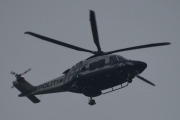 Morten 27 juni 2022 - LN-ORC besøker Høyenhall, det er Politihelikopteret som er ute i regnværet når andre holder seg inne