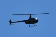 Morten 5 juli 2022 - LN-OGS over Høyenhall, det er Ove som kommer med sin Robinson R44 fra 2006