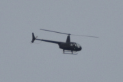 Morten 29 juni 2023 - Robinson R44 over Høyenhall, den er litt for langt unna