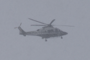 Morten 6 april 2023 - Politihelikopter over Høyenhall, det snør som bare det i dag, men Politiet er ute