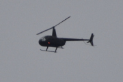 Morten 14 august 2025 - Robinson R44 over Høyenhall, klokken er 18.19 og dem er på vei til Kjeller flyplass. Dessverre litt for langt borte