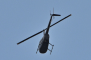 Morten 11 juni 2025 - Robinson R44 over Høyenhall, klokken er 17.23 og jeg ser at den har en stripe på siden og noe bak