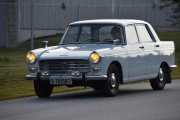 Her kommer det også en franskmann, bare av en annen variant. Det er en Peugeot  404 fra 1966