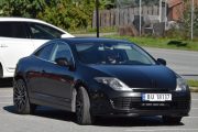 Her kommer det også en du ikke ser hver dag, det er en Renault Laguna Coupe fra 2010