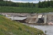 Jeg parkerer bilen og går siste stykke, Her ser vi Braskereidfoss kraftverk hvor en nettfeil på kraftverket skal ha fått slusene til ikke og gå opp