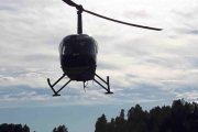 Her sitter vi i helikopteret, vi er ikke så høyt enda