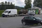 Sandgrunn tror jeg plassen heter, bilen på hengeren er møkkete det ser jeg med en gang