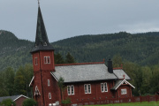 Evenstad kirke som også blir omtalt som kapell er fra 1904 og er en laftet langkirke med 120 plasser