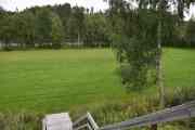Jeg går ned til området hvor vi skal være, er jo på størrelse med en fotballbane. Og du kan se Glomma i bakgrunnen og jeg som ikke har med meg fiskestang