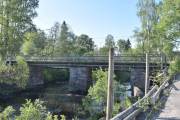 Denne kongeveien (kjerrevei) gikk gjennom Lillomarka,  forbi Røverkollen, ned til Skyttamyra og Markerud og gardimellom til Rotnesbrua. Deretter fulgte traseen stort sett dagens Gamlevei til Bjørnholt og videre Fuglåsveien opp  til Slettmoen og Varpet. Bare deler av traseen er synlig.  De gamle brufundamentene på Rotnesbrua fra 1801 står  fremdeles