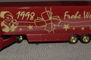 RENAULT Magnum INTEGRAL 1998 bordeauxrot mit goldner Schrift, goldenem Schneemann und goldner Schleife