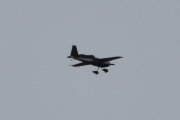 Morten 17 juni 2022 - Småfly over Høyenhall, kan det være Extra EA-230 Aerobatic?