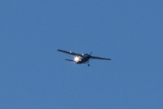 Morten 1 april 2023 - Cessna 208B Grand Caravan over Høyenhall, heller ikke her og solen blender meg litt