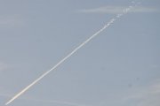 Morten 27 februar 2022 - Jetfly med rar stripe over Høyenhall, den krøller seg liksom