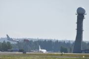 Morten 10 juli 2025 - Norwegian lander på Gardermoen flyplass, klokken er 10.32. Nå går jeg nesten litt i surr her