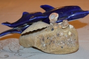 Delfin på sten